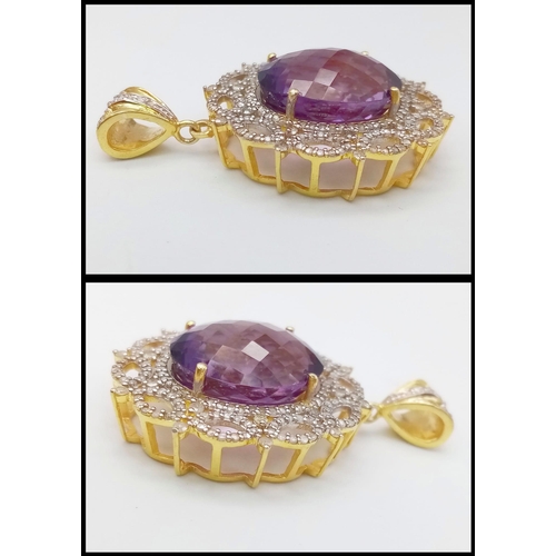 927 - A Mesmerising 50ct Brazilian Amethyst Gemstone Pendant with a white diamond decorative surround. 4cm... 