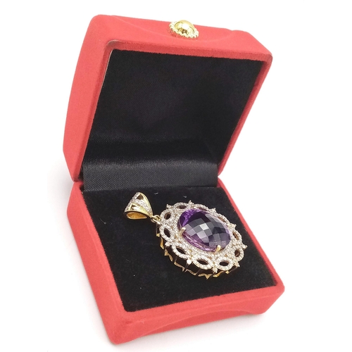 927 - A Mesmerising 50ct Brazilian Amethyst Gemstone Pendant with a white diamond decorative surround. 4cm... 