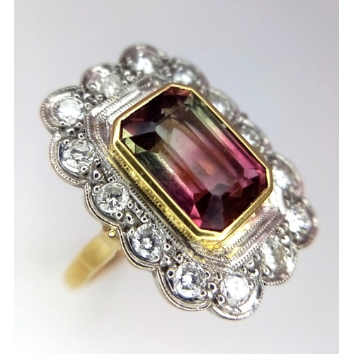 20 - 18K Yellow Gold, Diamond (0.45ct) Bordered Ring with a 3ct Emerald Cut Bi-Colour Tourmaline.
Weight:... 