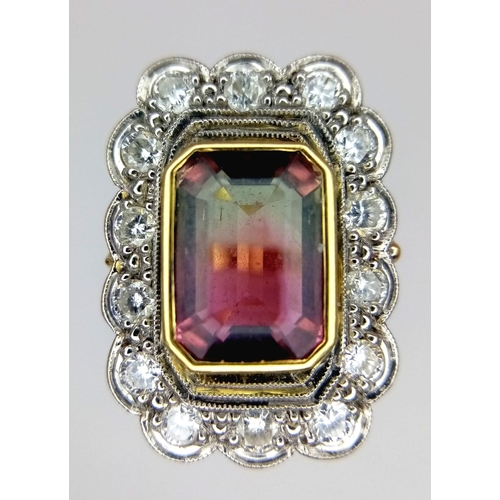 20 - 18K Yellow Gold, Diamond (0.45ct) Bordered Ring with a 3ct Emerald Cut Bi-Colour Tourmaline.
Weight:... 