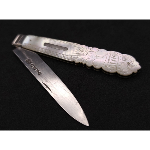 374 - An Antique Sterling Silver Fruit Knife. Decorative mother of pearl handle. Hallmarks for Sheffield 1... 