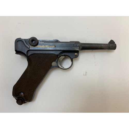 38 - A Deactivated German WW1 Luger P08 Dated 1918. It bears full matching numbers including the magazine... 