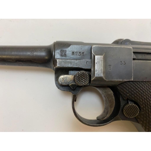 38 - A Deactivated German WW1 Luger P08 Dated 1918. It bears full matching numbers including the magazine... 