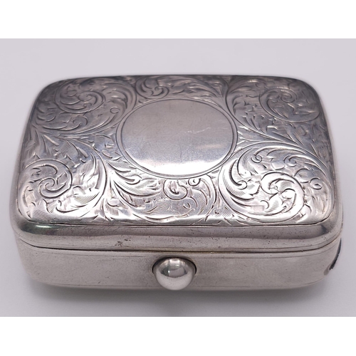 381 - An Antique Sterling Silver Vesta Case . Scroll engraved lid with empty cartouche. Hinge works well. ... 