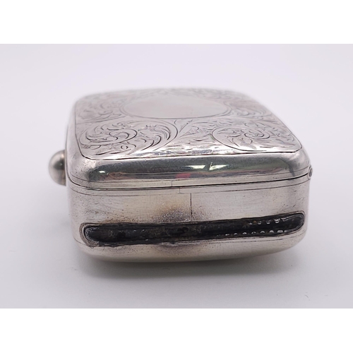 381 - An Antique Sterling Silver Vesta Case . Scroll engraved lid with empty cartouche. Hinge works well. ... 