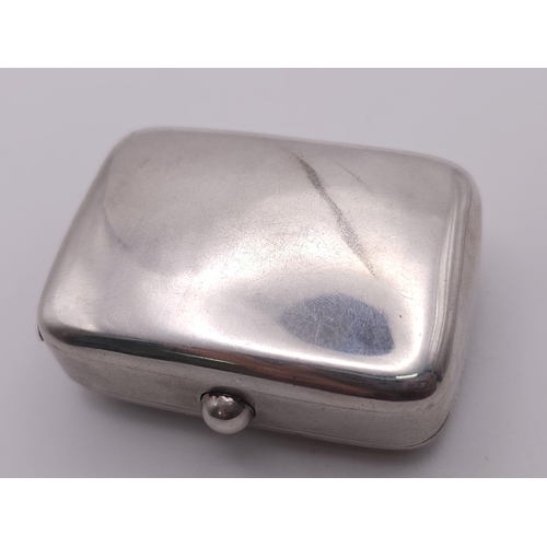 381 - An Antique Sterling Silver Vesta Case . Scroll engraved lid with empty cartouche. Hinge works well. ... 