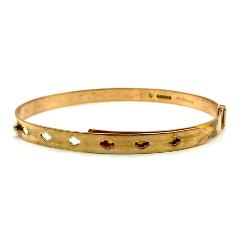 387 - A 9K GOLD ADJUSTABLE BELT STYLE BANGLE .16.8gms