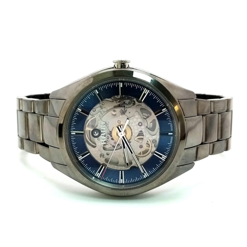 507 - A Stylish Rado Automatic Skeleton Gents Watch. Stainless steel strap and case - 42mm. Outer blue and... 