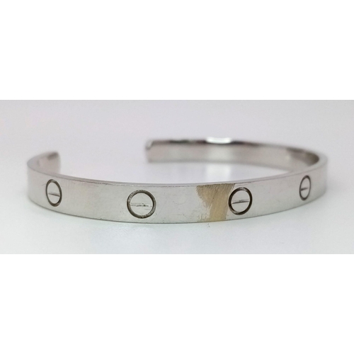 6 - A 18K WHITE GOLD CARTIER STYLE BANGLE 25.8G