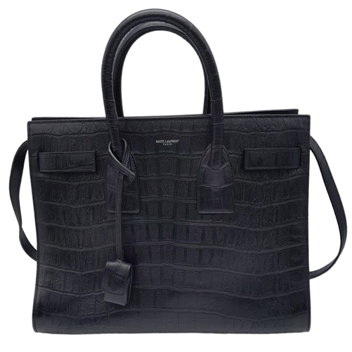 67 - A Saint Laurent Sac de Jour Handbag. Crocodile embossed leather exterior with silver hardware and de... 