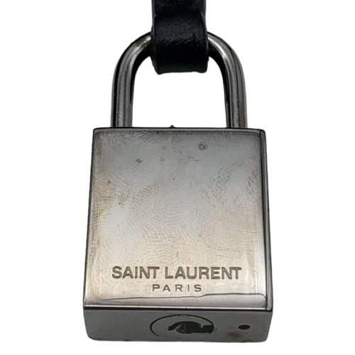 67 - A Saint Laurent Sac de Jour Handbag. Crocodile embossed leather exterior with silver hardware and de... 