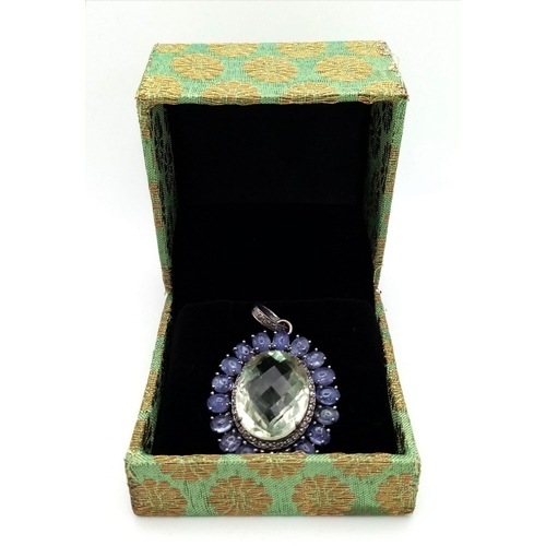 738 - A Green Amethyst with Tanzanite and Rose-Cut Diamond Halos Pendant. Set in 925 silver. Amethyst - 30... 