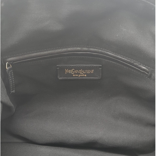 74 - An Yves Saint Laurent Black Easy Bag. Leather exterior with gold hardware, double zipper, and 5 prot... 