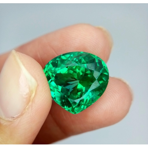 935 - A Gorgeous 22ct Green Tourmaline Gemstone. Heart shape cut with a trillion faceted base. No visible ... 