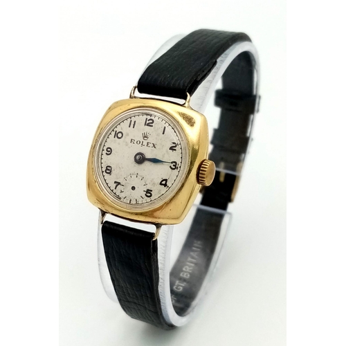 197 - A Rare Vintage (1950s) Rolex Ladies 18k Gold Mechanical Watch. Black leather strap. 18k gold square ... 