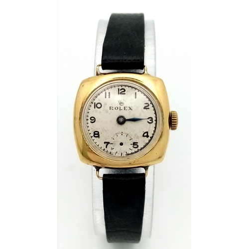 197 - A Rare Vintage (1950s) Rolex Ladies 18k Gold Mechanical Watch. Black leather strap. 18k gold square ... 