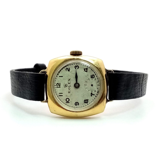 197 - A Rare Vintage (1950s) Rolex Ladies 18k Gold Mechanical Watch. Black leather strap. 18k gold square ... 