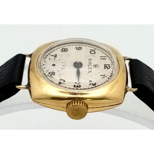 197 - A Rare Vintage (1950s) Rolex Ladies 18k Gold Mechanical Watch. Black leather strap. 18k gold square ... 