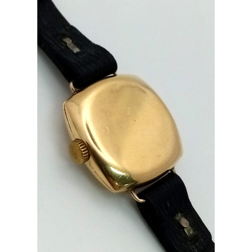 197 - A Rare Vintage (1950s) Rolex Ladies 18k Gold Mechanical Watch. Black leather strap. 18k gold square ... 