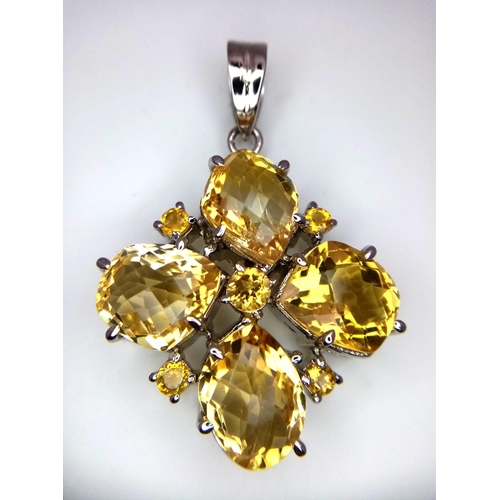 678 - A Clover-Leaf Citrine Four Stone 925 Silver Pendant. Citrines - 30ctw. 16.30g total weight. 5cm. 16.... 