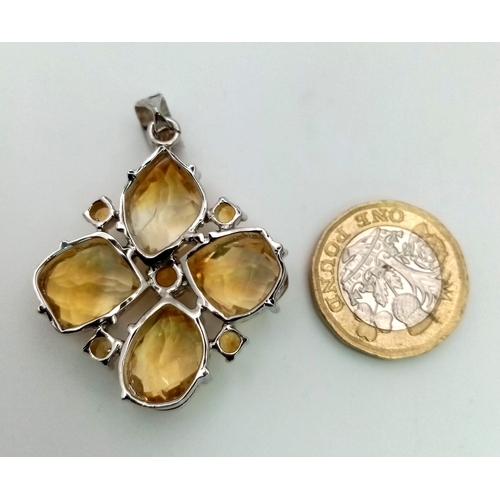 678 - A Clover-Leaf Citrine Four Stone 925 Silver Pendant. Citrines - 30ctw. 16.30g total weight. 5cm. 16.... 