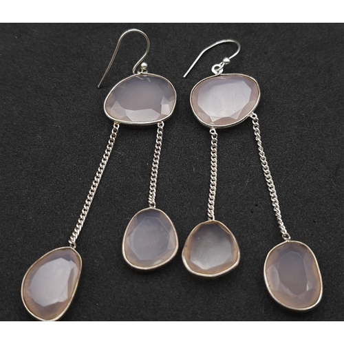 920 - A Pair of Rose Quartz 925 Silver Drop Earrings. Rose quartz - 50ctw. Drop 7cm. 13.10g total weight. ... 