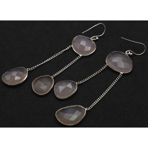 920 - A Pair of Rose Quartz 925 Silver Drop Earrings. Rose quartz - 50ctw. Drop 7cm. 13.10g total weight. ... 