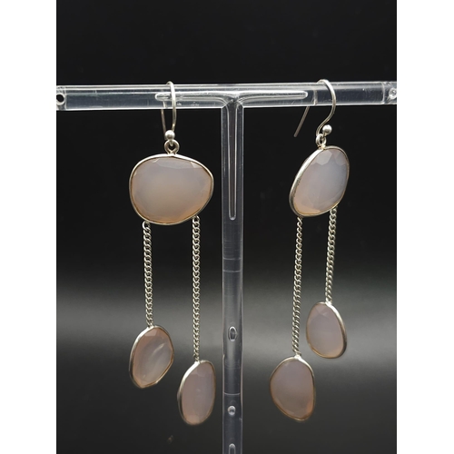 920 - A Pair of Rose Quartz 925 Silver Drop Earrings. Rose quartz - 50ctw. Drop 7cm. 13.10g total weight. ... 