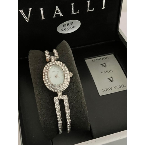 385 - Ladies Quartz VIALLI DRESS WATCH. Having oval mother of pearl face with Diamanté surround. Diamante ... 