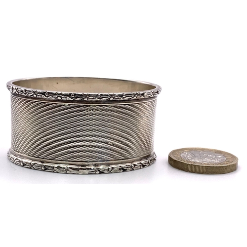 740 - A Rare George VI, 1937/8 Hallmarked Napkin Ring in its Original Fitted Case.
31.68 Grams.