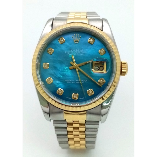 36 - A Rolex Oyster Perpetual Datejust Bi-Metal Gents Watch. Bi-metal bracelet and case - 36mm. Ice-blue ... 