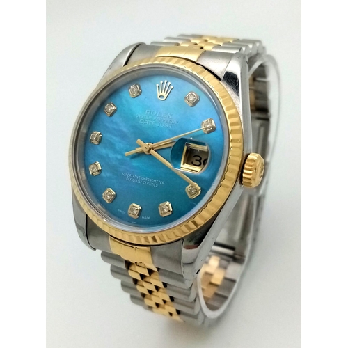 36 - A Rolex Oyster Perpetual Datejust Bi-Metal Gents Watch. Bi-metal bracelet and case - 36mm. Ice-blue ... 