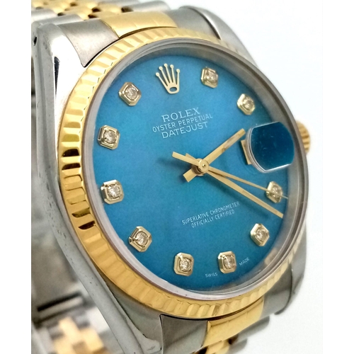 36 - A Rolex Oyster Perpetual Datejust Bi-Metal Gents Watch. Bi-metal bracelet and case - 36mm. Ice-blue ... 