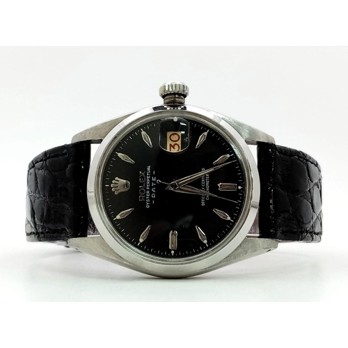 570 - A Rolex Oyster Perpetual Datejust Automatic Gents Watch. Black leather strap. Stainless steel case -... 