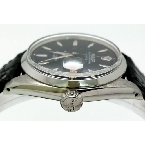 570 - A Rolex Oyster Perpetual Datejust Automatic Gents Watch. Black leather strap. Stainless steel case -... 