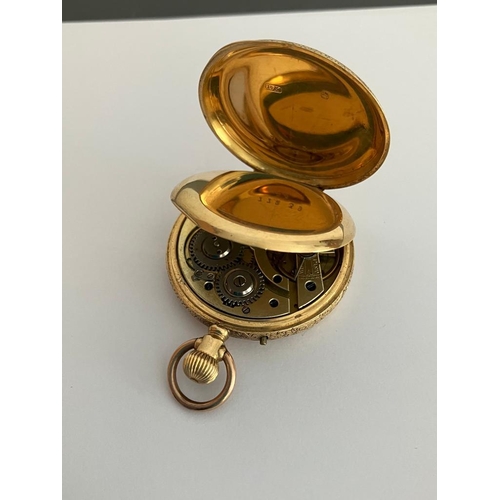 238 - Beautiful Ladies Antique 18 carat GOLD POCKET WATCH. High-quality decorative engraving with an extra... 