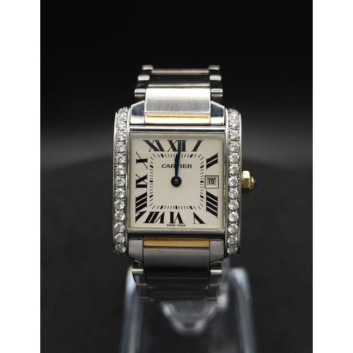 24 - Cartier 'Tank' Quartz Movement Ladies Watch.
Set with 30 diamonds on a 34mm face with a stainless st... 