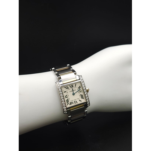 24 - Cartier 'Tank' Quartz Movement Ladies Watch.
Set with 30 diamonds on a 34mm face with a stainless st... 