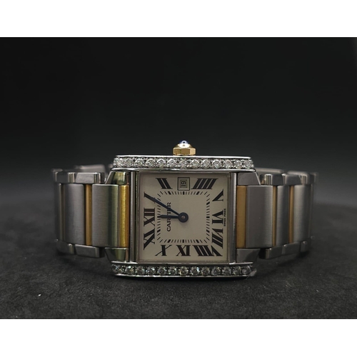 24 - Cartier 'Tank' Quartz Movement Ladies Watch.
Set with 30 diamonds on a 34mm face with a stainless st... 