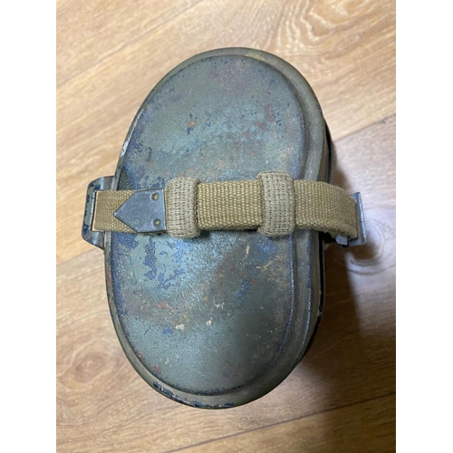 268 - A WW2 German Afrika Korp Canteen. The lid is marked RBNR - the strap is marked lux. ML448.