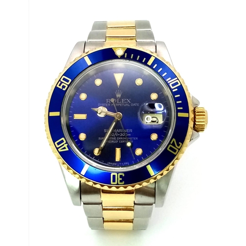 309 - A Classic Rolex Bi-Metal Submariner Gents Watch. Bi-metal bracelet and case - 40mm. Midnight blue be... 