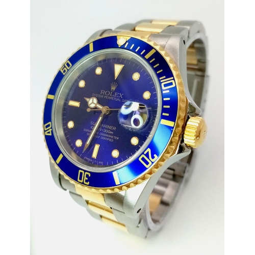 309 - A Classic Rolex Bi-Metal Submariner Gents Watch. Bi-metal bracelet and case - 40mm. Midnight blue be... 