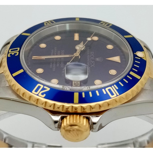 309 - A Classic Rolex Bi-Metal Submariner Gents Watch. Bi-metal bracelet and case - 40mm. Midnight blue be... 