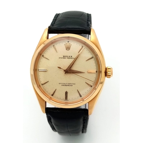 323 - A Vintage 18K Gold Rolex Oyster Perpetual Automatic Gents Watch. Black leather strap. 18k gold case ... 