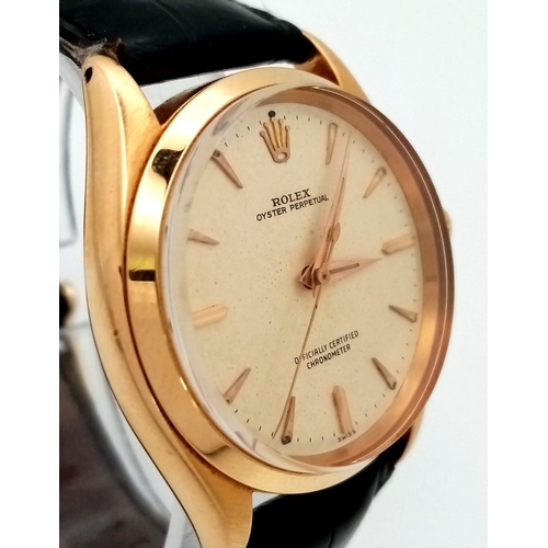 323 - A Vintage 18K Gold Rolex Oyster Perpetual Automatic Gents Watch. Black leather strap. 18k gold case ... 