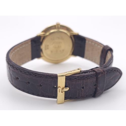 22 - A Vintage 18K Gold Piaget Gents Watch with Hypnotic Dial. Brown crocodile strap. 18k gold case - 30m... 