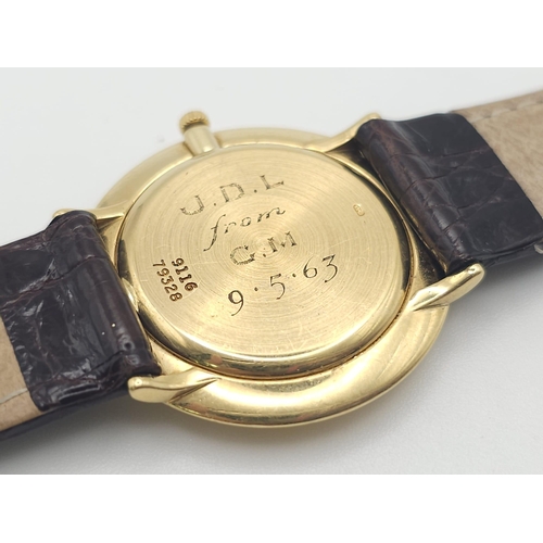 22 - A Vintage 18K Gold Piaget Gents Watch with Hypnotic Dial. Brown crocodile strap. 18k gold case - 30m... 