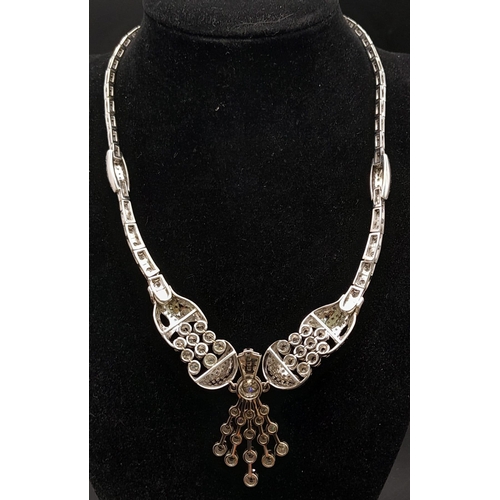 556 - A Stunning 18K White Gold Diamond Lavaliere Ladies Necklace. Round and brilliant round cut diamonds ... 