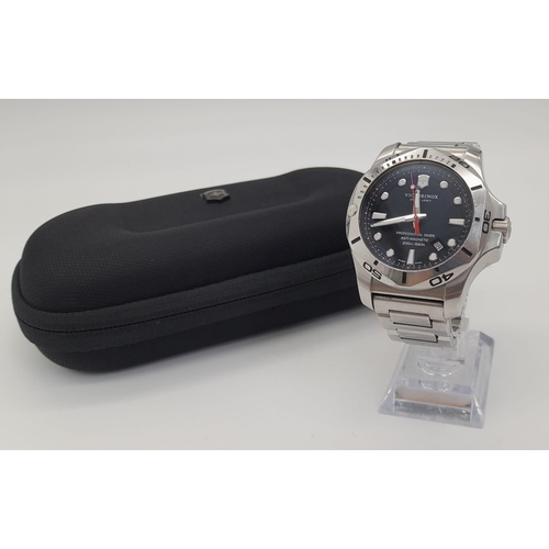 617 - A Victorinox Swiss Army Gents Watch. Stainless steel bracelet and case - 46mm. Black dial with date ... 