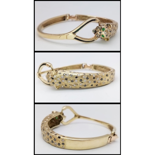 947 - 9kt Yellow Gold Bracelet with Diamond encrusted Leopard.
Stunning design of the Emerald eyed leopard... 